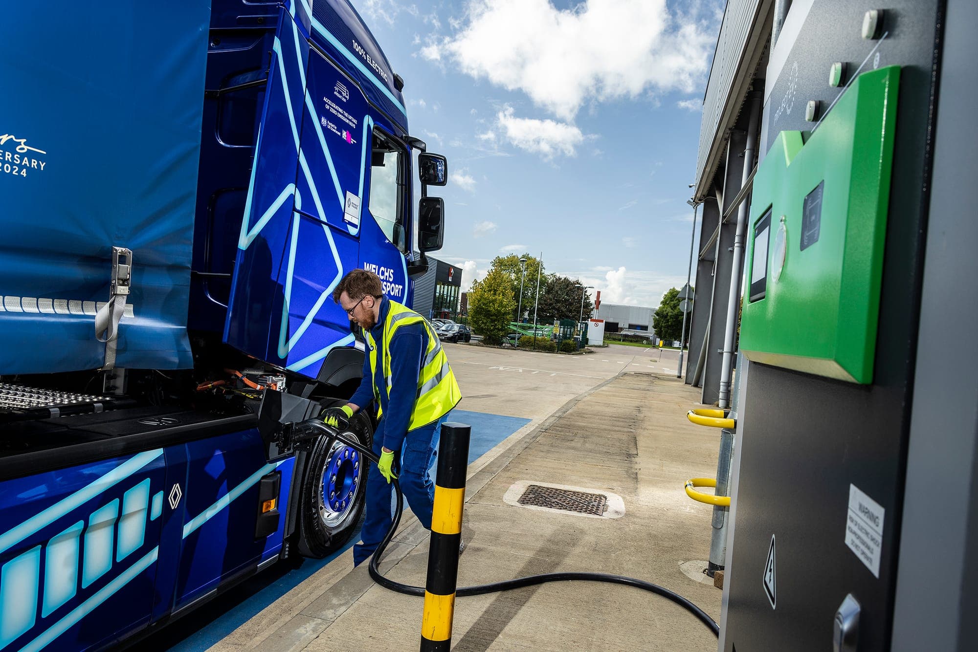 An electric HGV charging at a depot chargepoint